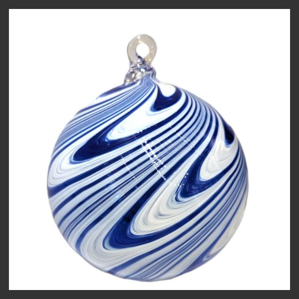 A glass ornament with swirling blue and white patterns and a clear loop at the top for hanging, set against a white background with a black border.