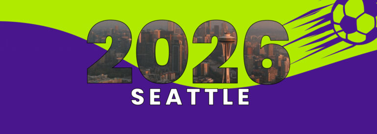 Bold “2026” with Seattle skyline inside the numbers, the word “Seattle” below in white, set on a lime green and purple background with a stylized soccer ball graphic in the top right corner.
