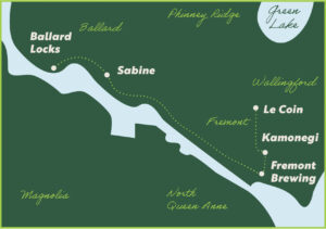 A stylized map showing Ballard Locks, Sabine, Le Coin, Kamonegi, and Fremont Brewing, with neighborhoods labeled: Ballard, Magnolia, North Queen Anne, Wallingford, Fremont, Phinney Ridge, and Green Lake.