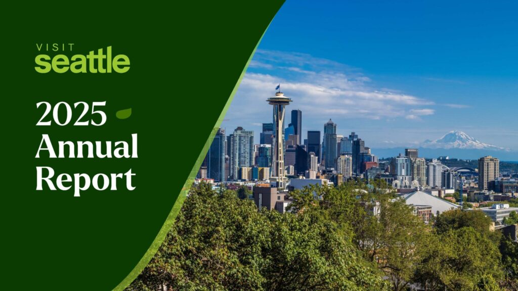 Cover of Visit Seattle 2025 Annual Report with a view of the Seattle skyline, including the Space Needle, Mount Rainier in the distance, and green trees in the foreground.