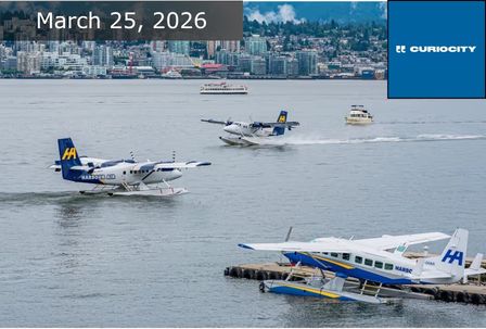 Three seaplanes with blue and yellow tails are on the water near a dock, with a city skyline and boats in the background. The text reads: "March 25, 2026" and "CURIOSITY" in a blue box in the top right corner.